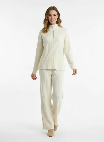 effortless sophisticated  creamy white sweater paired with wide-leg pants