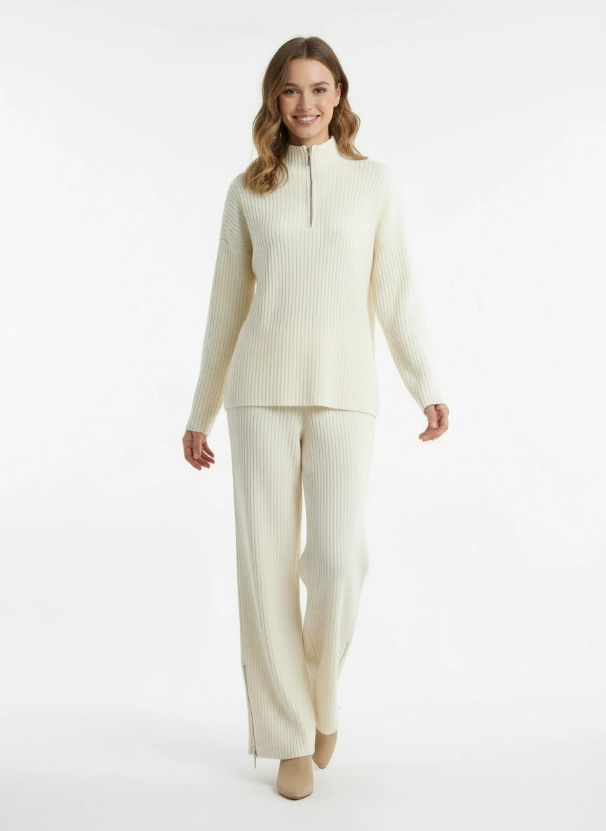 effortless sophisticated  creamy white sweater paired with wide-leg pants