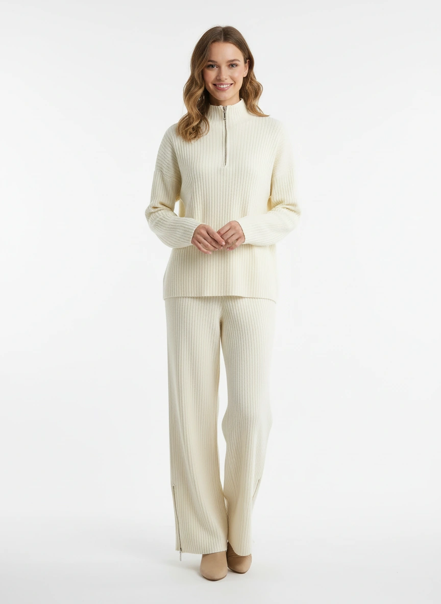 effortless sophisticated  creamy white sweater paired with wide-leg pants