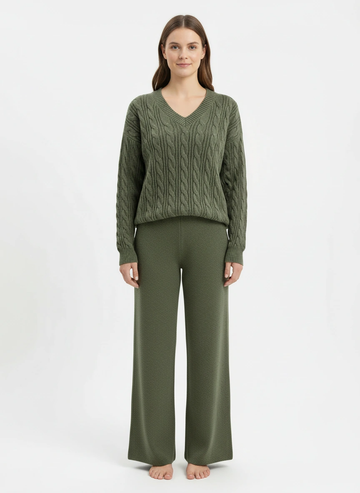 dark green v neck sweater and wide leg pants