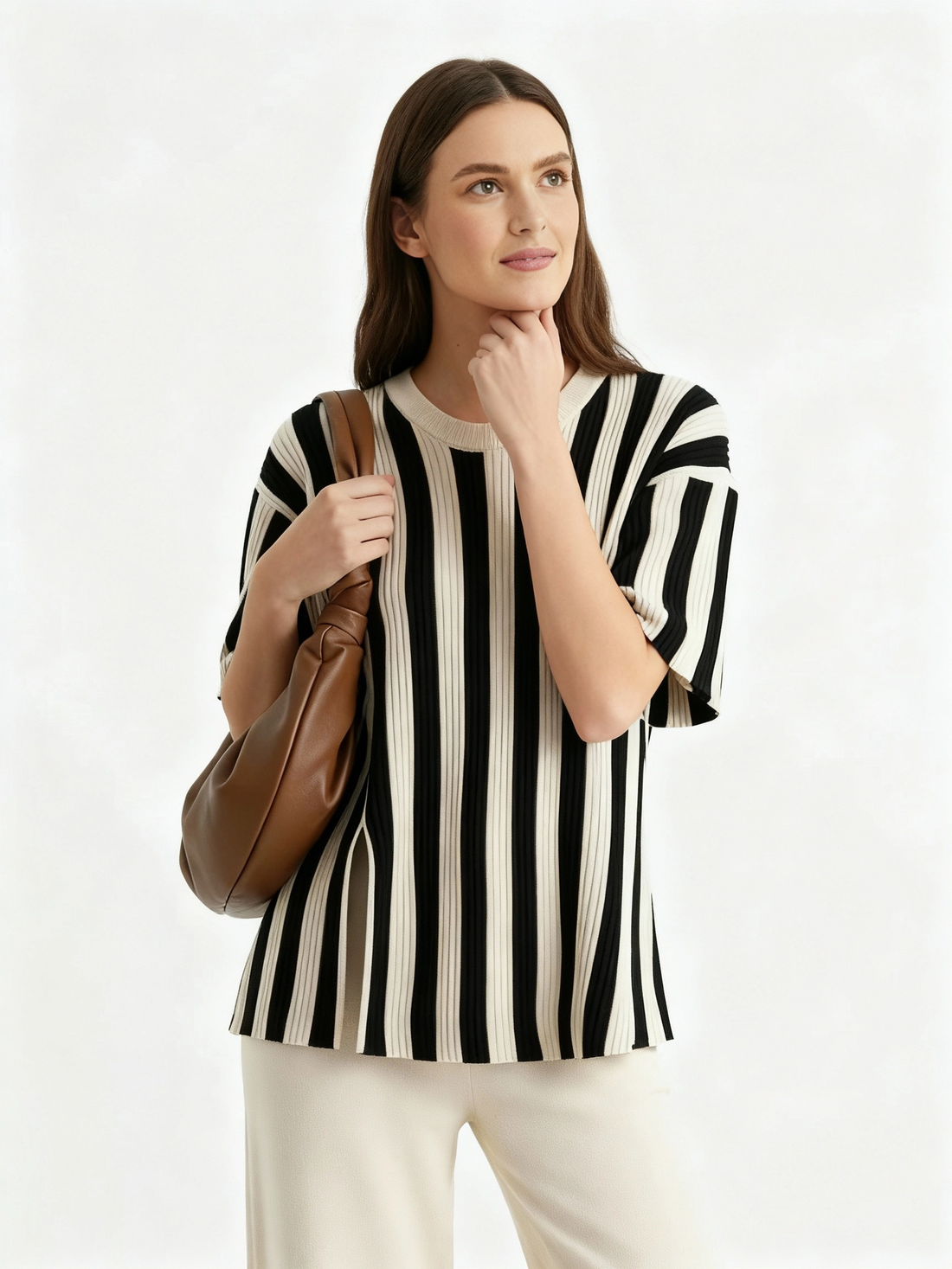 creamy white t-shirt featuring bold black stripes